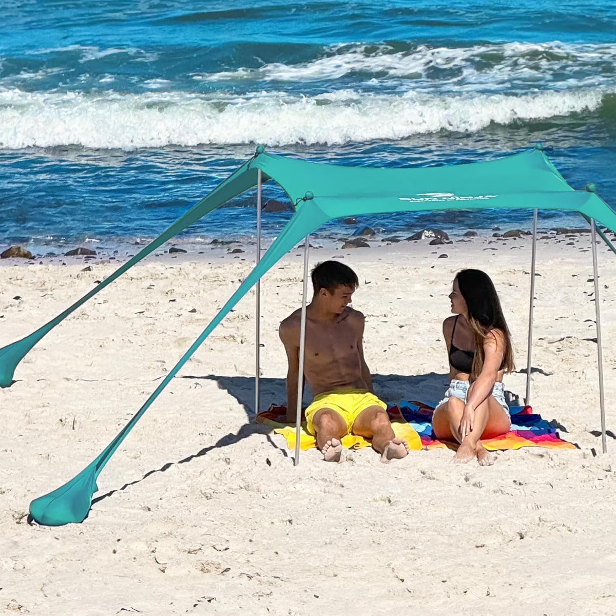 SUN NINJA 10x10.5 FT Pop-Up Beach Tent with Sand Shovel, Pegs & Stability Poles �C Navy Blue Sun Shelter for Beach, Camping & Outdoor Activities